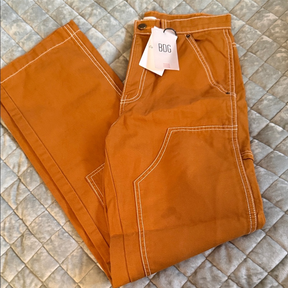 NWT BDG Rust , burnt Orange Utility Work Pants with White. They are not orange.